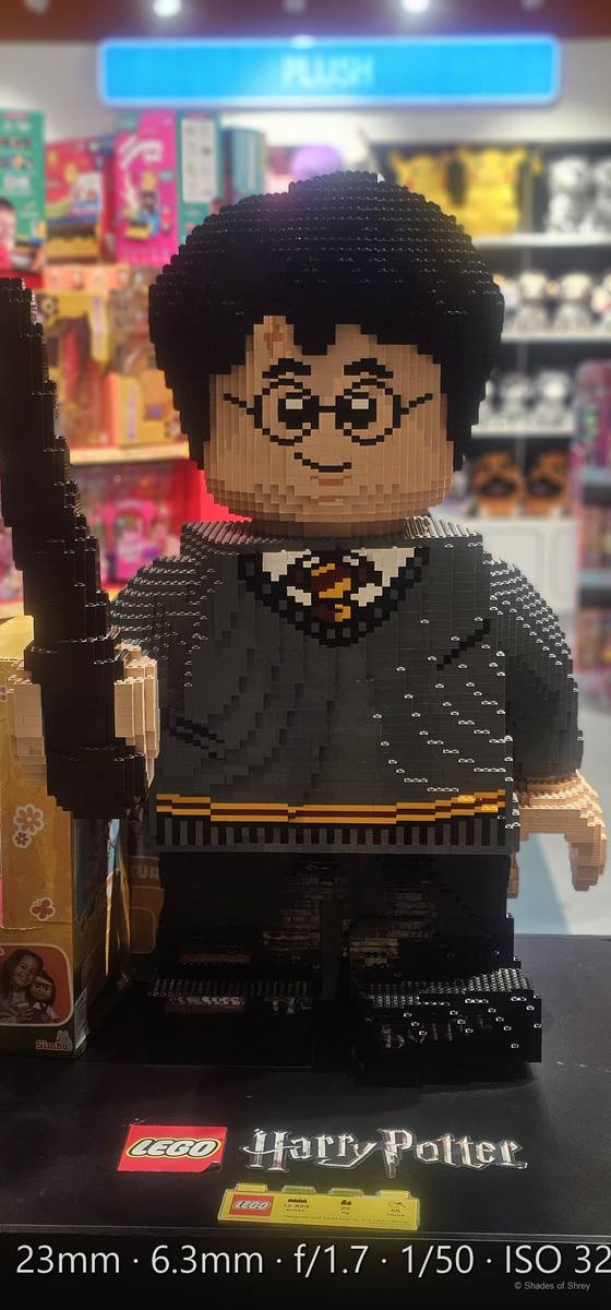 Giant LEGO Harry Potter figure on display in a toy store