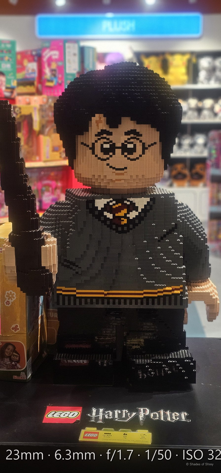 Giant LEGO Harry Potter figure on display in a toy store